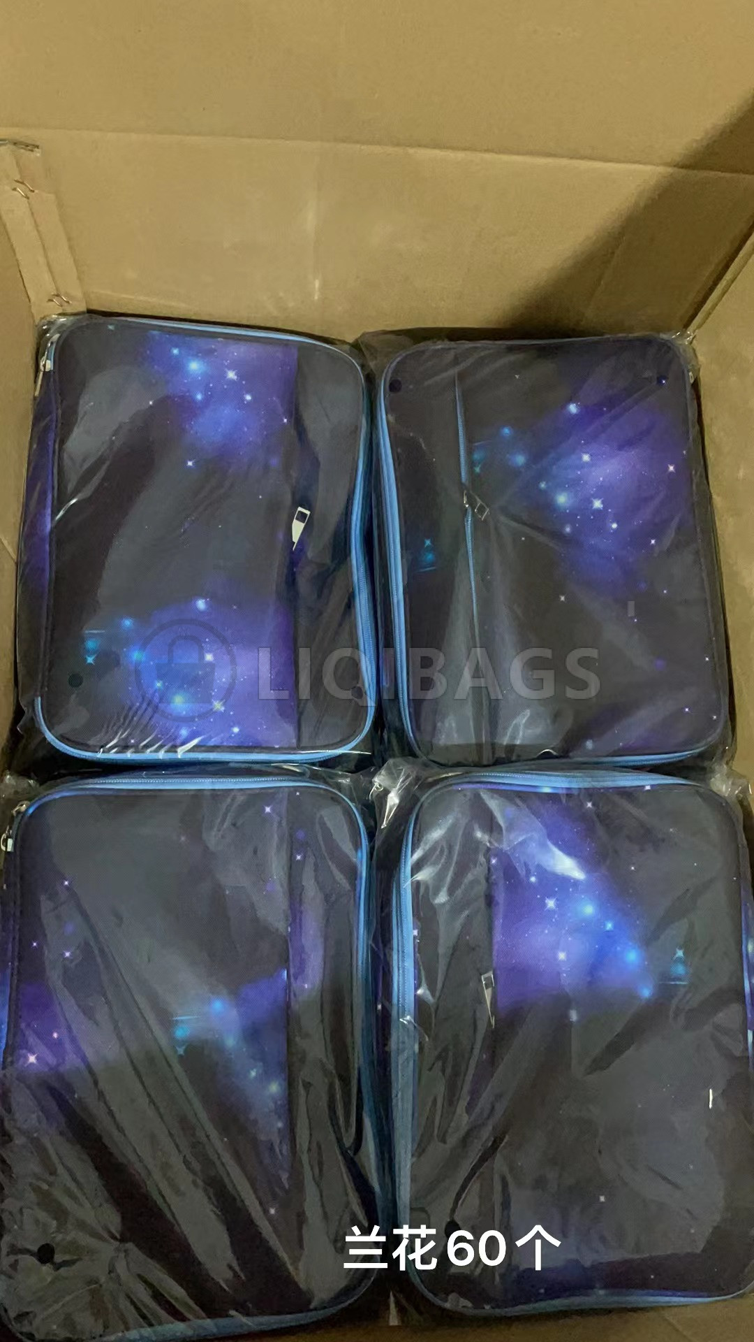 Galaxy-print Bible covers packed together in a carton in Liqi Bag's successful case gallery