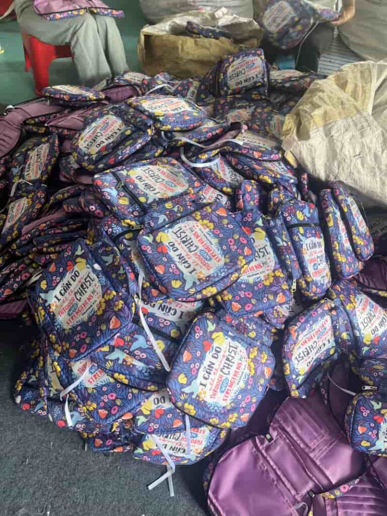 Bulk navy floral Scripture Bible covers in production