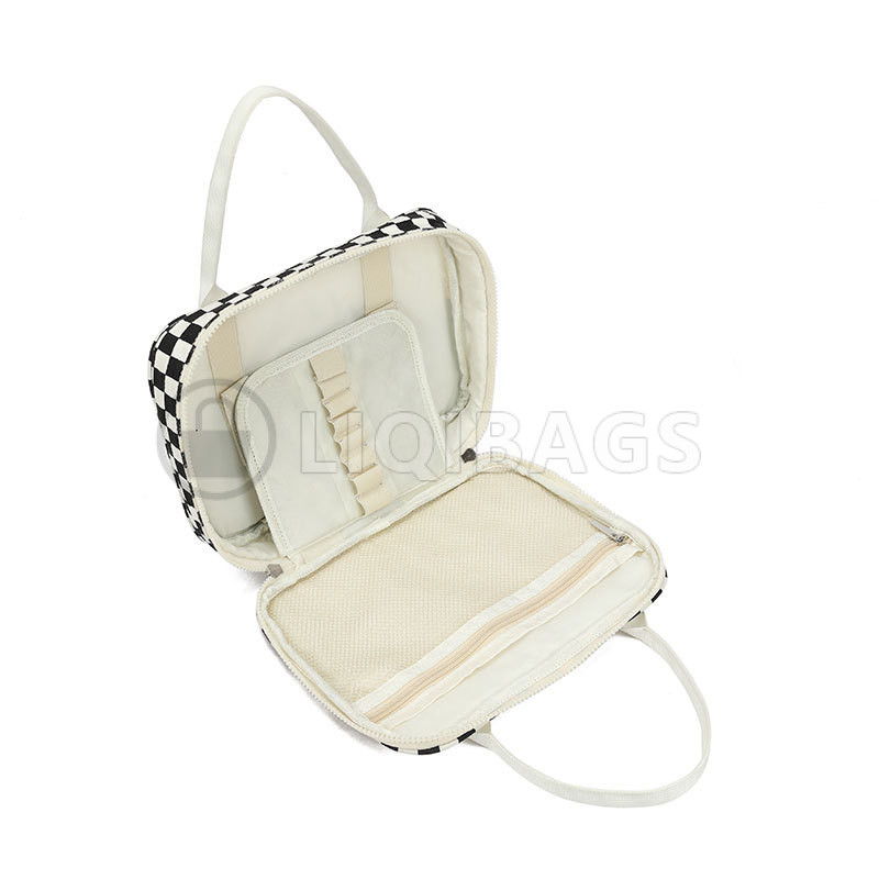 Open checkered book cover with pockets and pen holders