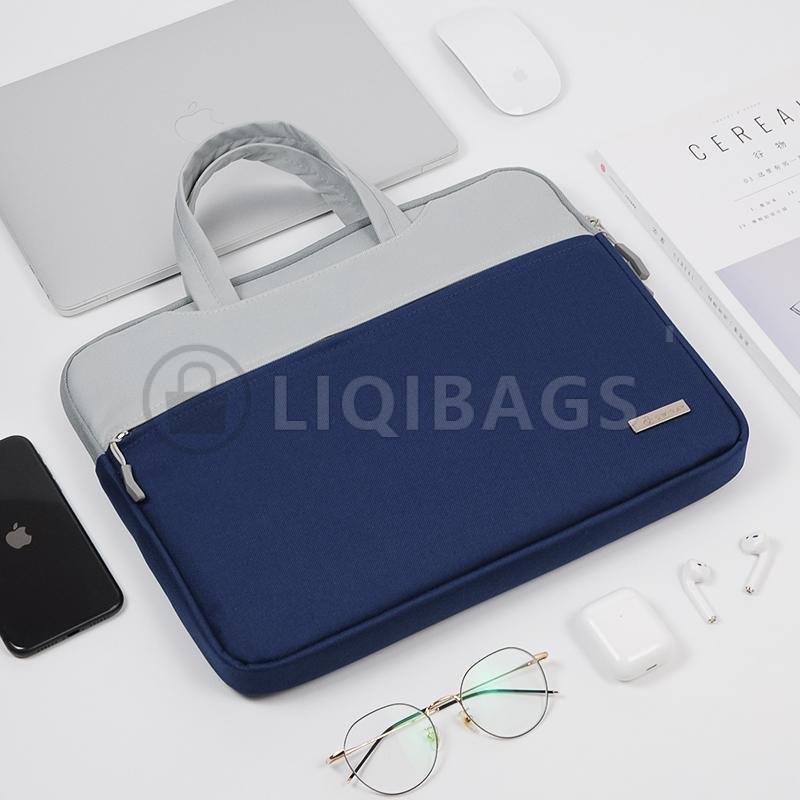 Custom navy laptop sleeve with carry handles