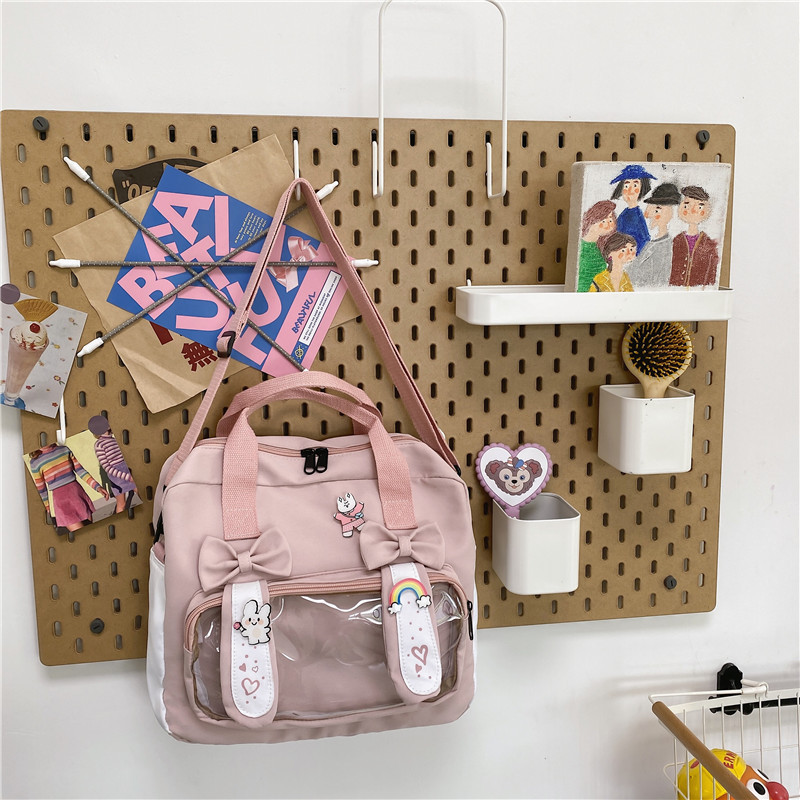 Black cute canvas crossbody school bag display