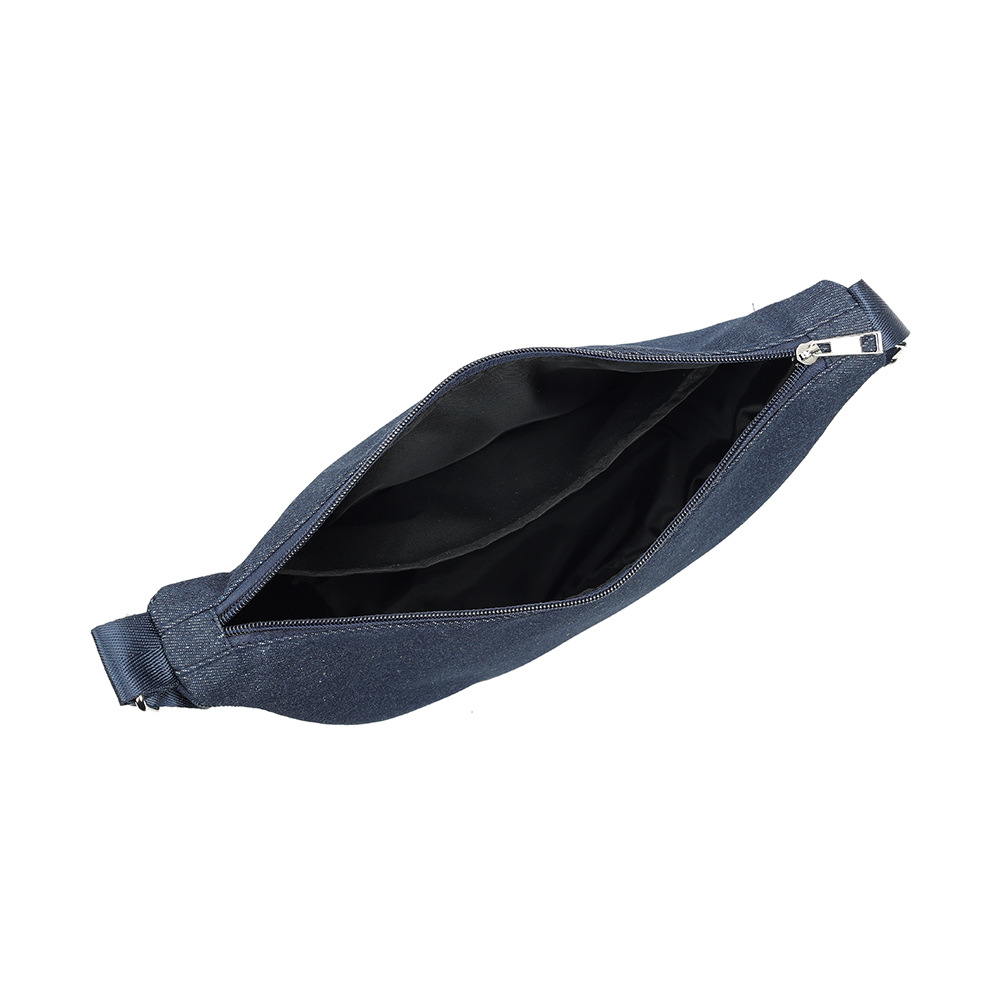 Open denim crescent bag showing interior pocket
